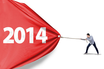 Asian man is pulling new year of 2014