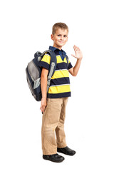 Schoolboy sitting on books. Back to school