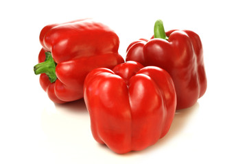 Three red bell peppers