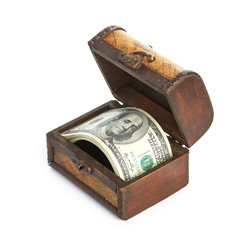 Dollar-bills in the old wooden treasure chest