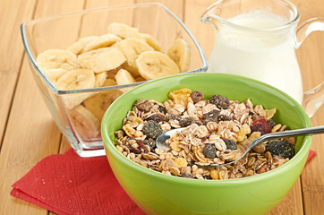 Delicious and healthy cereal in bowl with milk