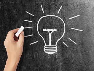 Hand drawing light bulb