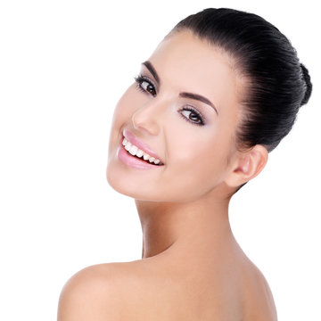 Beautiful face of young woman with clean skin