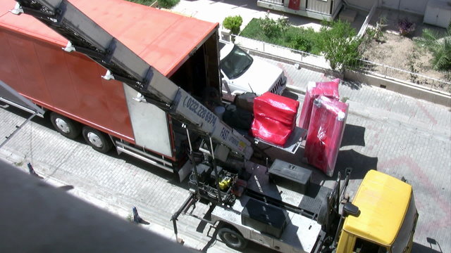 Moving truck in a house driveway