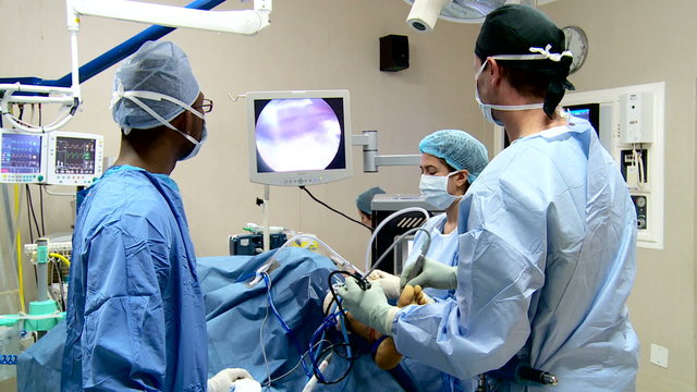 doctors performing operation