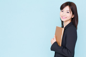 asian businesswoman on blue background