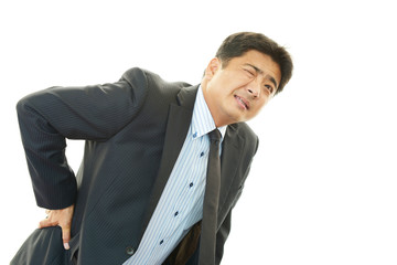 腰痛のビジネスマン