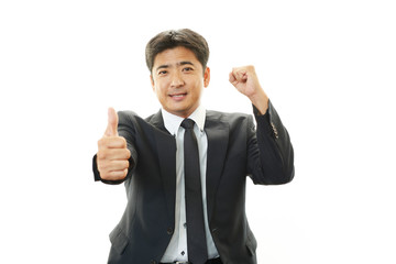 ガッツポーズのビジネスマン