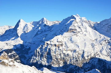 Naklejka premium Eiger, Moench and Jungfrau, famous Swiss mountain peaks