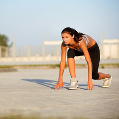 Athletic Runner Training in a park for Marathon. Fitness Girl Ru