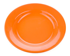 Orange empty plate on white background