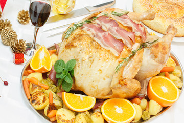 Bacon Roasted Turkey on festive table. Close up