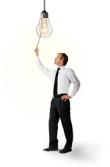 Fototapeta premium Businessmann macht das Licht an