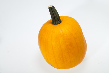 Fresh orange pumpkin isolated on white background