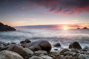 Sunset at Porth Nanven Cove in cornwall
