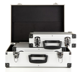 Silvery suitcases isolated on white