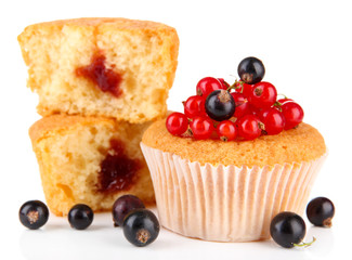 Tasty muffins with berries isolated on white