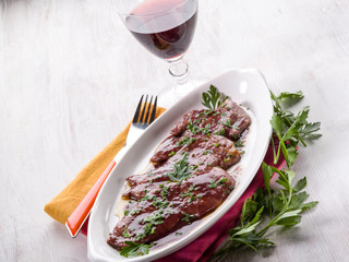 escalope cooked on red wine
