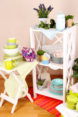 Beautiful white furniture with tableware and decor,