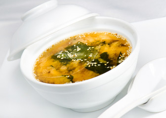 Asian noodle soup with fungus   and shrimp in front