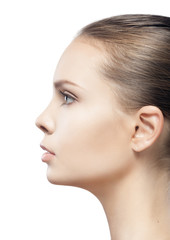 profile portrait of beautiful young woman with clean skin isolat