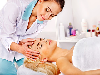 Fototapeta na wymiar Woman getting facial massage .