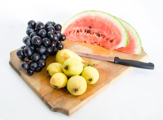 Fresh fruit on a wood board