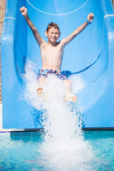 Boy on a water slide