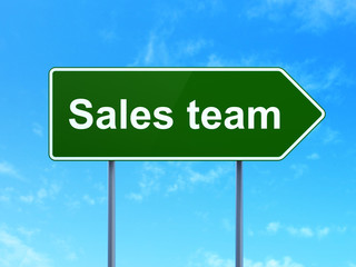 Marketing concept: Sales Team on road sign background
