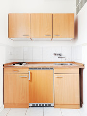 white kitchen with furniture set