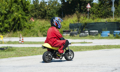 Young biker on minibike