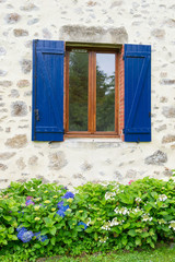 Fototapeta na wymiar French window with shutters