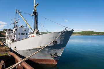 Naklejka premium Fishing boat is moored