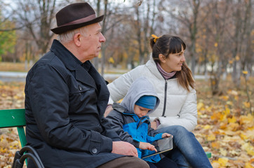 Three generations of a family at the park