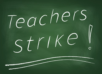 The school board on which is written in chalk "Teachers strike"