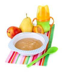 Tasty baby fruit puree and baby bottle isolated on white