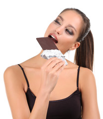 Portrait of beautiful young girl with chocolate isolated