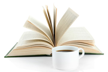 Cup of coffee and book isolated on white