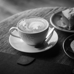 hot coffee on grunge wood background