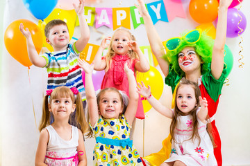 jolly kids group and clown on birthday party