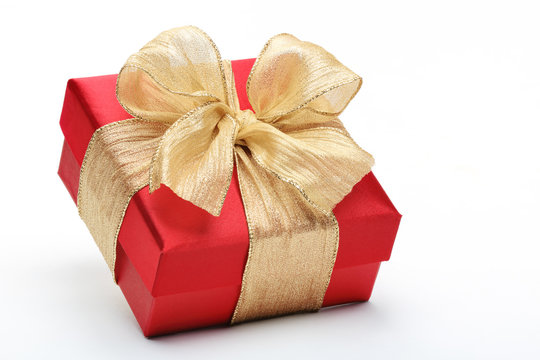 Red gift box with gold ribbon bow