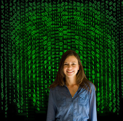 Nerd computer businesswoman on matrix binary background