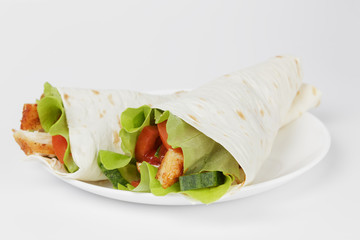 wheat tortilla with chicken and vegetables