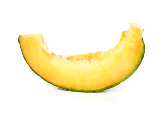 Slice of cantaloupe melon isolated