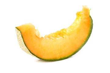 Slice of cantaloupe melon isolated