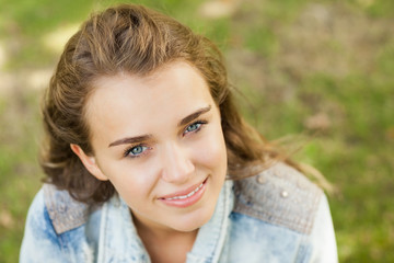 Fototapeta premium Pretty cheerful student looking at camera