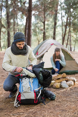 Fototapeta premium Young couple camping in the wilderness