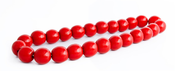 Wooden red beads isolated