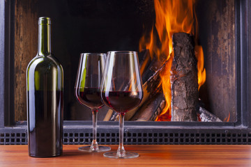 drinks at fireplace on winter evening