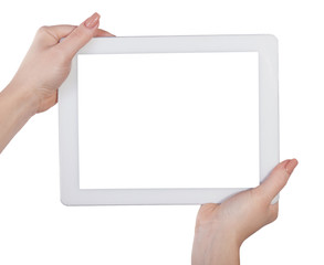 Obraz premium tablet in hands on an isolated